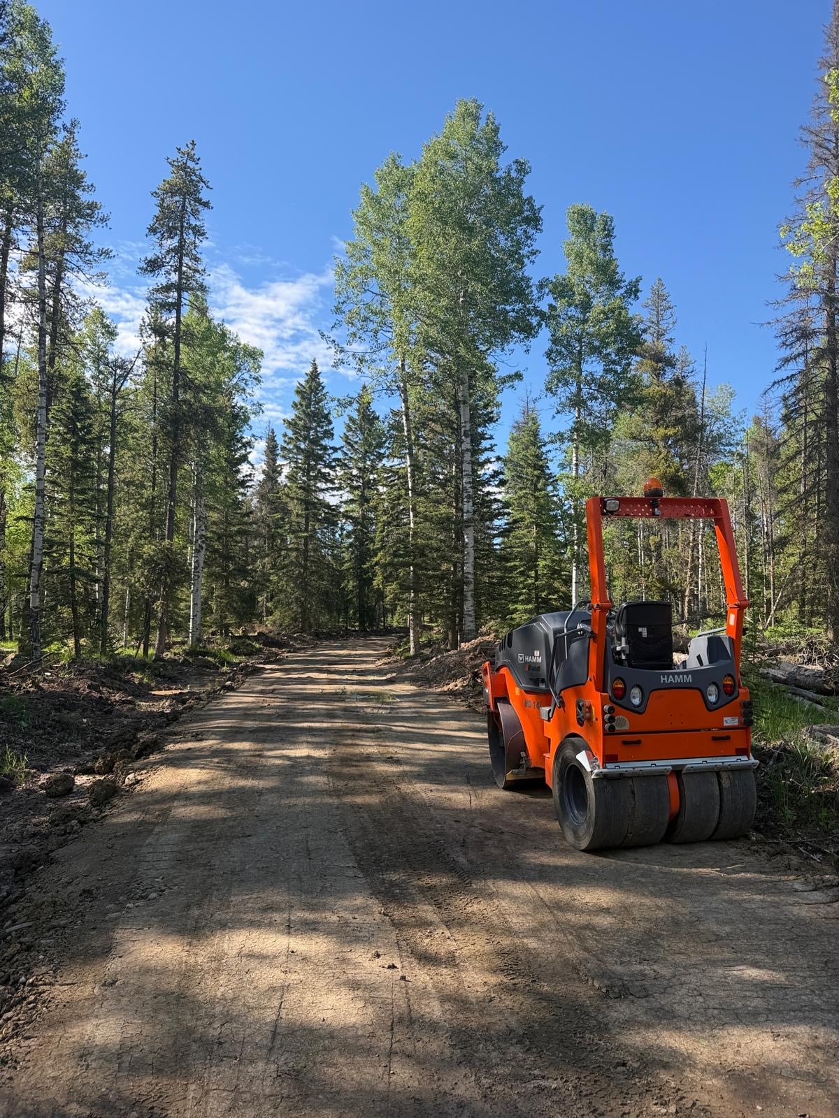 Road compaction roller Calgary by Kinsmen Consulting